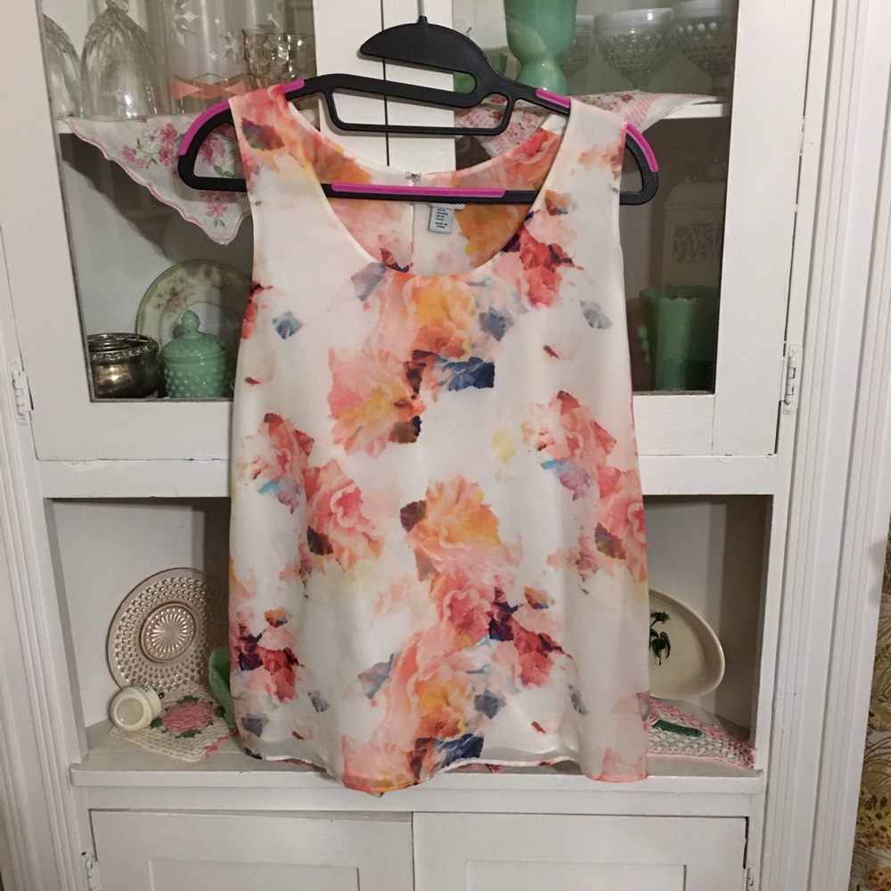 Sleeveless peach and blue floral print blouse